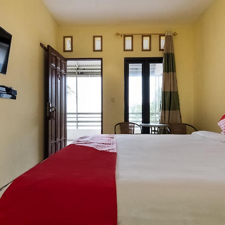 Отель Oyo 3050 Hotasi Seaview Syariah Аньер Экстерьер фото