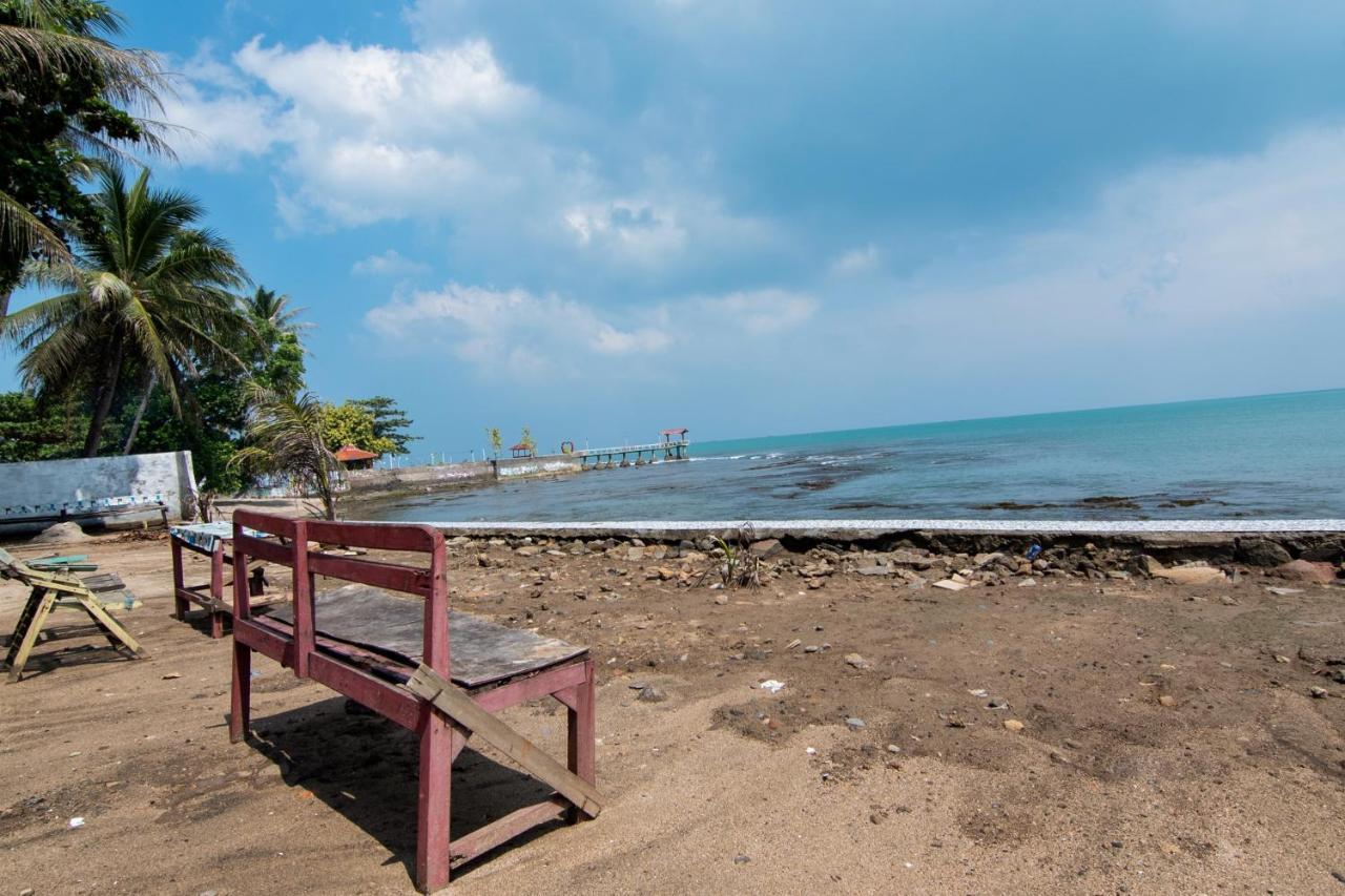 Отель Oyo 3050 Hotasi Seaview Syariah Аньер Экстерьер фото