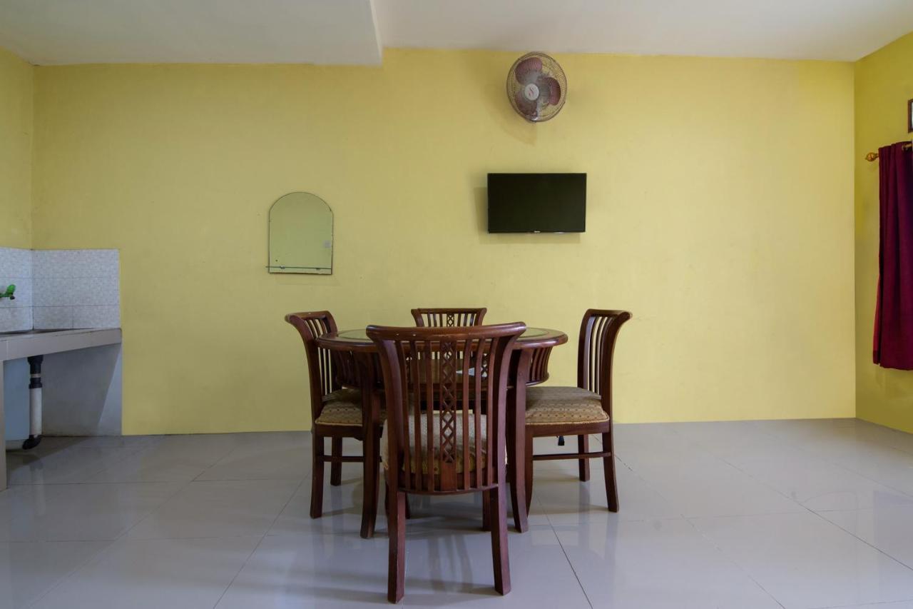 Отель Oyo 3050 Hotasi Seaview Syariah Аньер Экстерьер фото