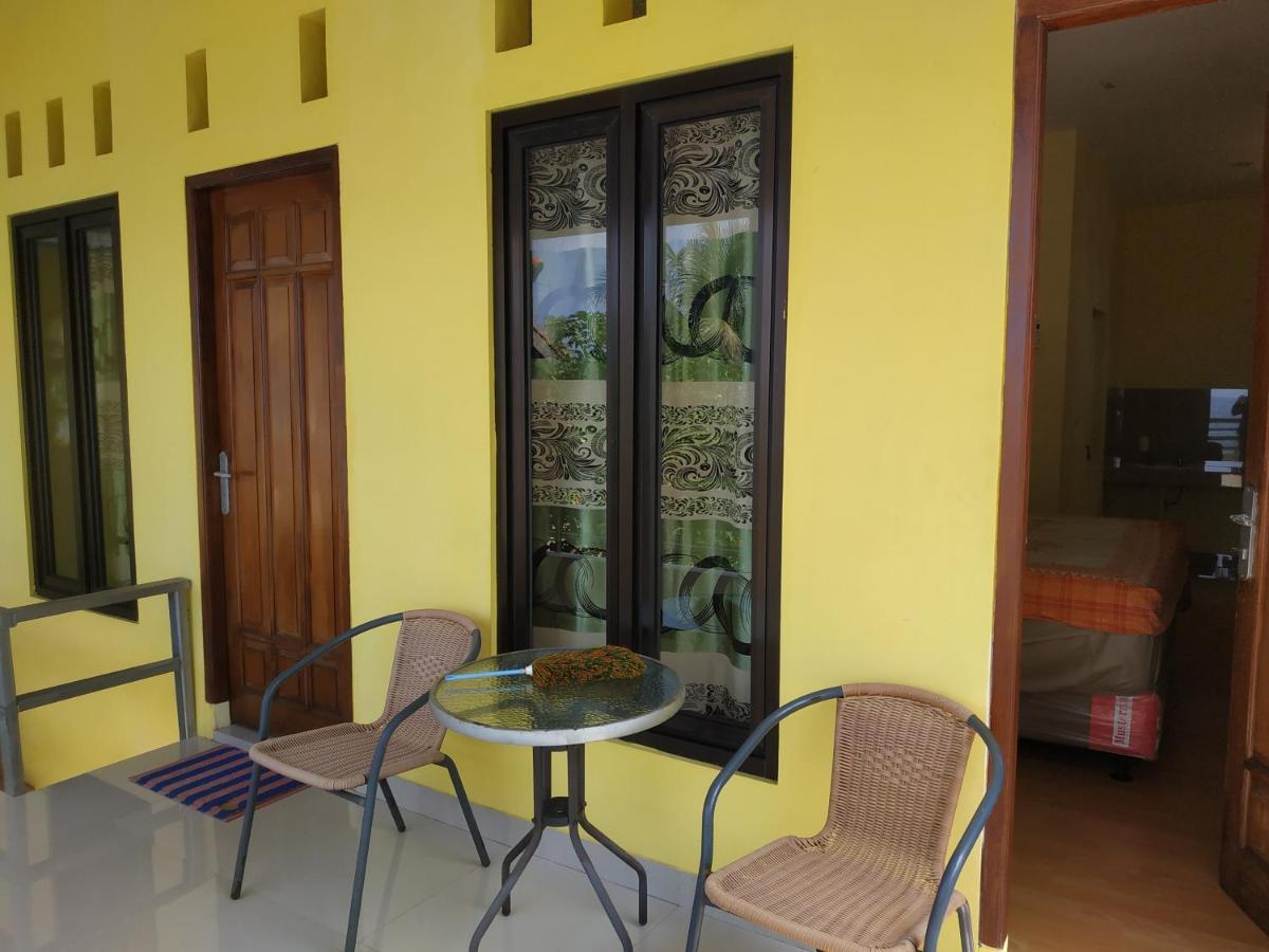 Отель Oyo 3050 Hotasi Seaview Syariah Аньер Экстерьер фото